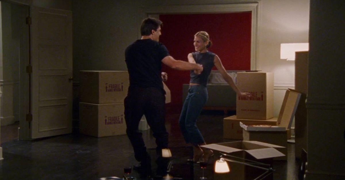 (lr): Chris Noth como Big dançando com Sarah Jessica Parker como Carrie.