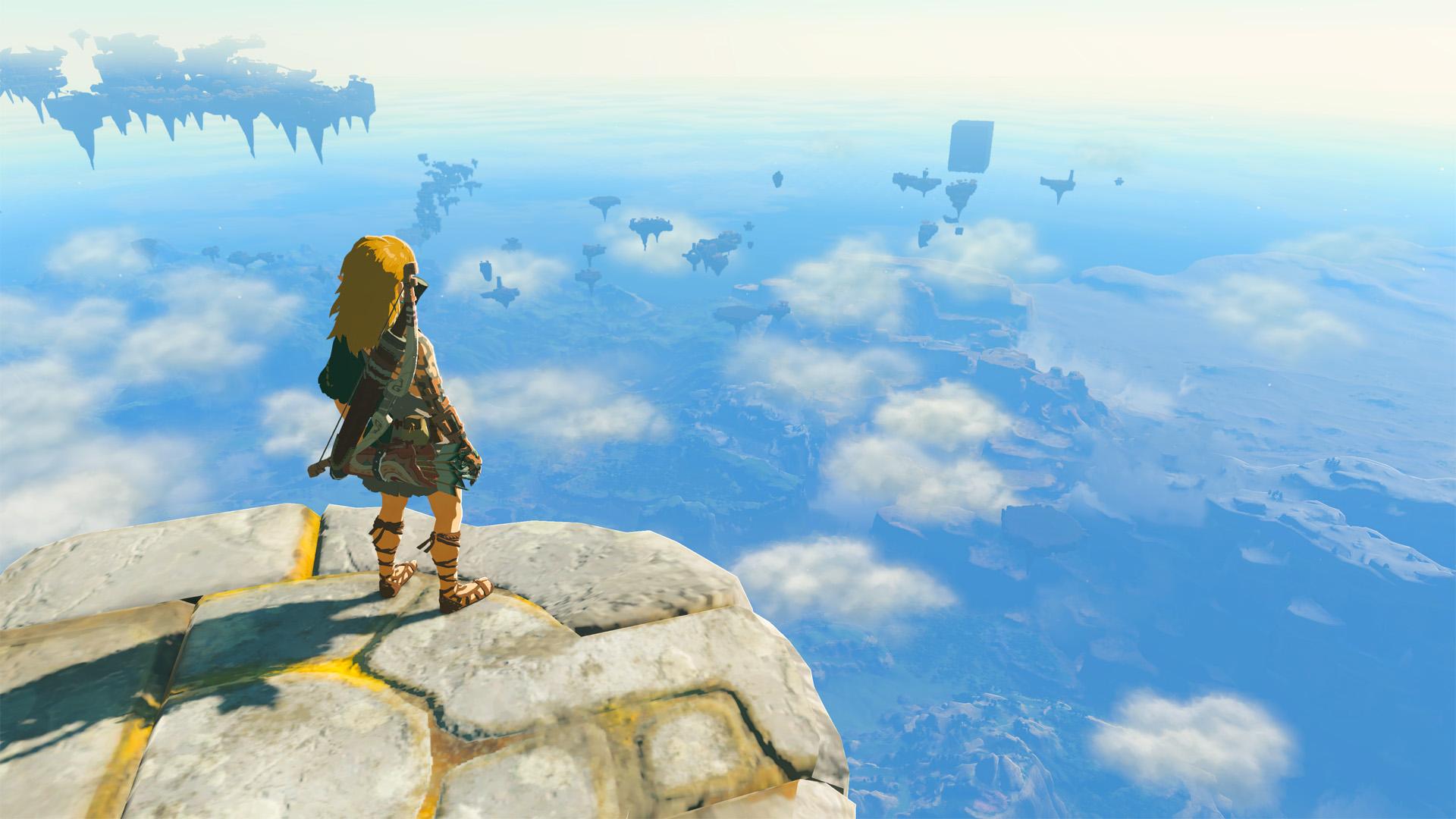'Lágrimas do Reino' Link olhando para Hyrule no topo de uma ilha no céu.