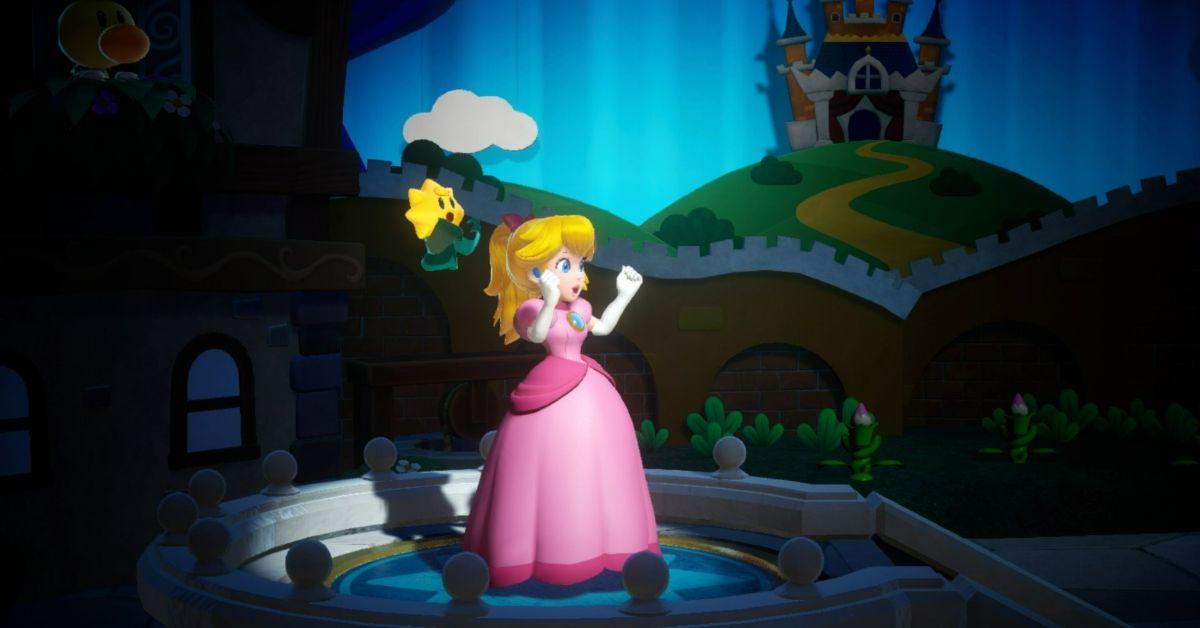 La Principessa Peach in piedi su un palco nel gioco per Switch senza titolo.