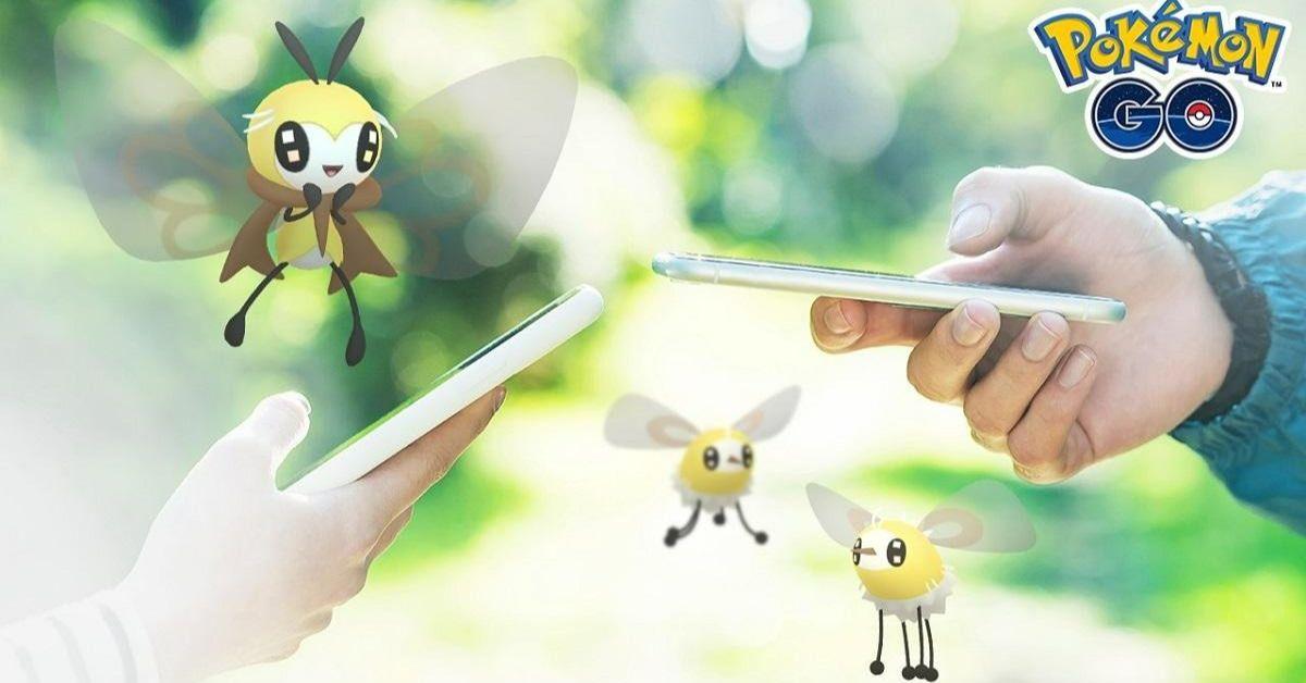 Cutiefly di Pokémon GO accanto a uno smartphone.