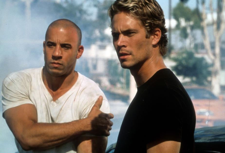 Vin Diesel e Paul Walker em cena do filme 'Velozes e Furiosos', de 2001. 