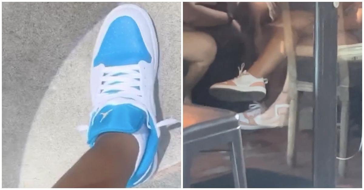 Sort mand sammenligner sine blå Nikes med en hvid mæcen lyserød og hvid Nikes i parlamentet i Dallas. 