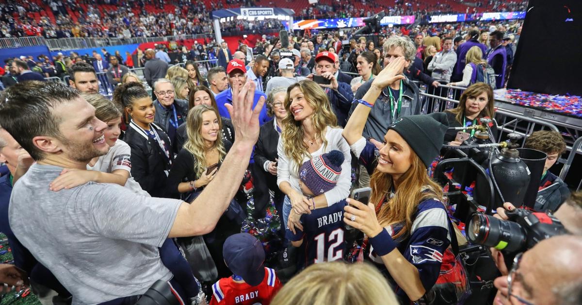 Tom Brady high fiving-syster Julie 2019