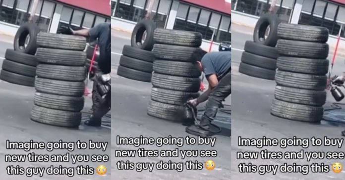 Kunden fanger dækbutiksmedarbejderen 